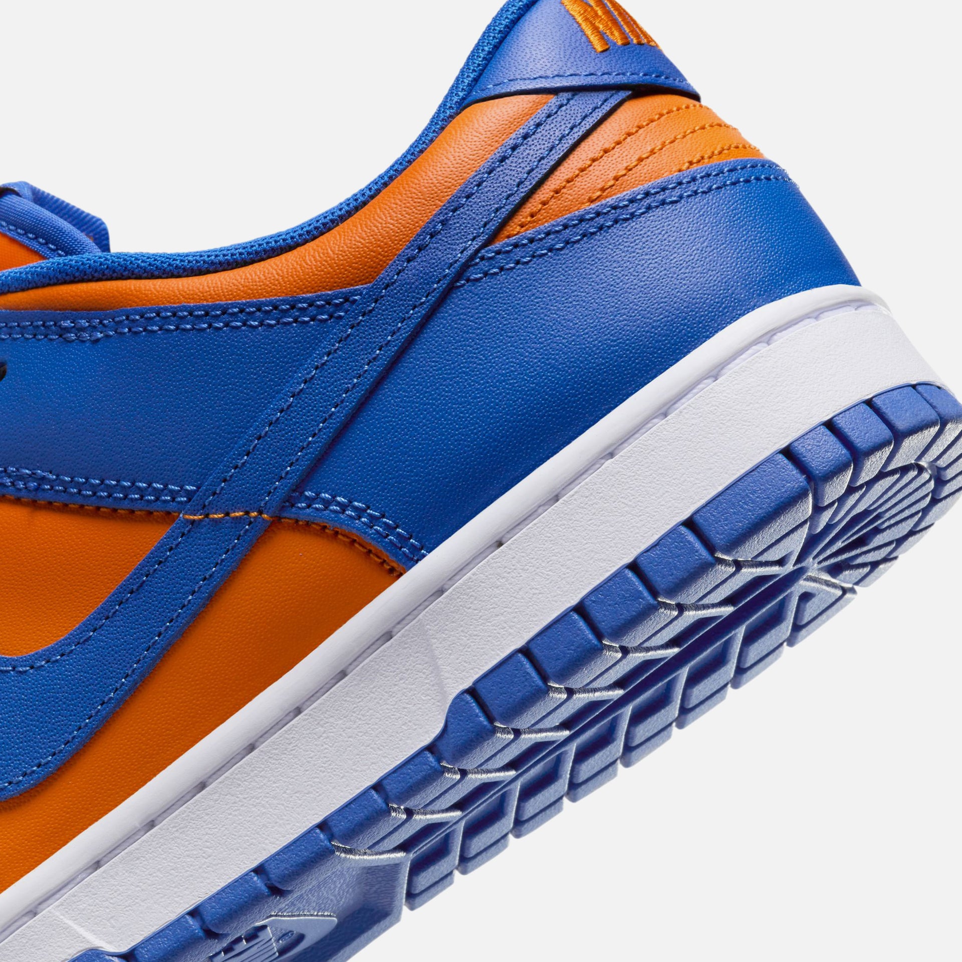 Nike Dunk Low Retro - Bright Ceramic / Team Royal / University Red