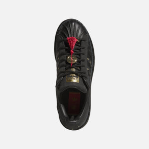 adidas x CLOT Lunar New Year Superstar - Core Black / Carbon Black / Metallic Gold